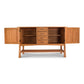 Contemporary Craftsman Huntboard by Vermont Furniture Designs, featuring solid wood craftsmanship, shelves, and drawers on four sturdy legs.