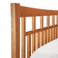 Detail of the right siderail on the Contemporary Craftsman Low Footboard Bed by Vermont Furniture Designs, showcasing premium American craftsmanship.