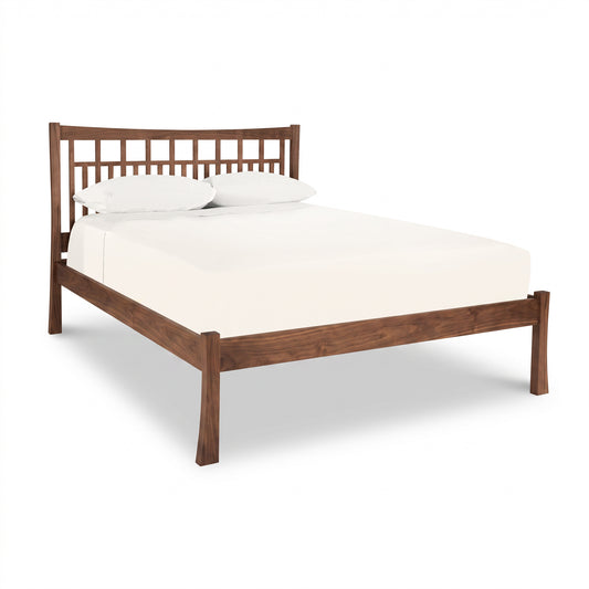 Contemporary Craftsman Low Footboard Bed by Vermont Furniture Designs in solid wood with slatted headboard, mattress, and pillows.