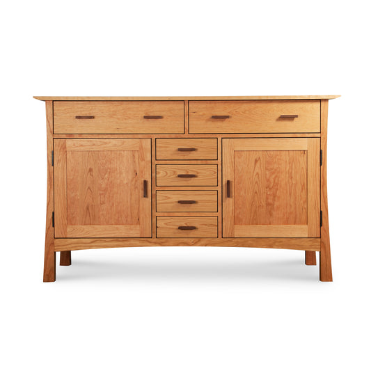 Vermont Furniture Designs Contemporary Craftsman Sideboard features sleek drawers, cabinets, and rectangular handles in a modern, American-made design.