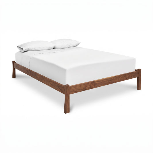 Contemporary Craftsman Studio-Style Platform Bed by Vermont Furniture Designs with mattress and pillows, showcasing quality American craftsmanship.