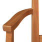 Contemporary Shaker Chair armrest by Vermont Woods Studios, showcasing smooth natural wood grain and a sustainably handcrafted curved design.