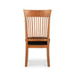 Contemporary Shaker Chair with vertical slatted back and black cushioned seat, crafted by Vermont Woods Studios.