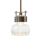 Cuff Large Mini Pendant by Hubbardton Forge, made with clear glass and hand-forged steel, highlights modern American craftsmanship in lighting design.