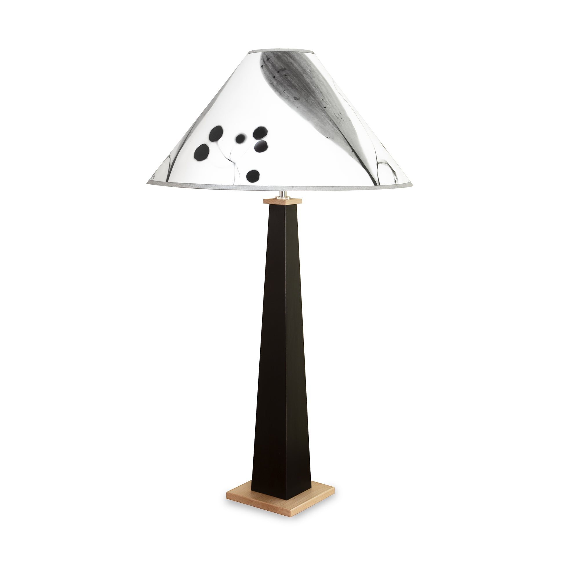 Dance of Life Table Lamp by Rock River Studio featuring a black sculpted base and white shade with elegant black patterns, showcasing artisan craftsmanship.