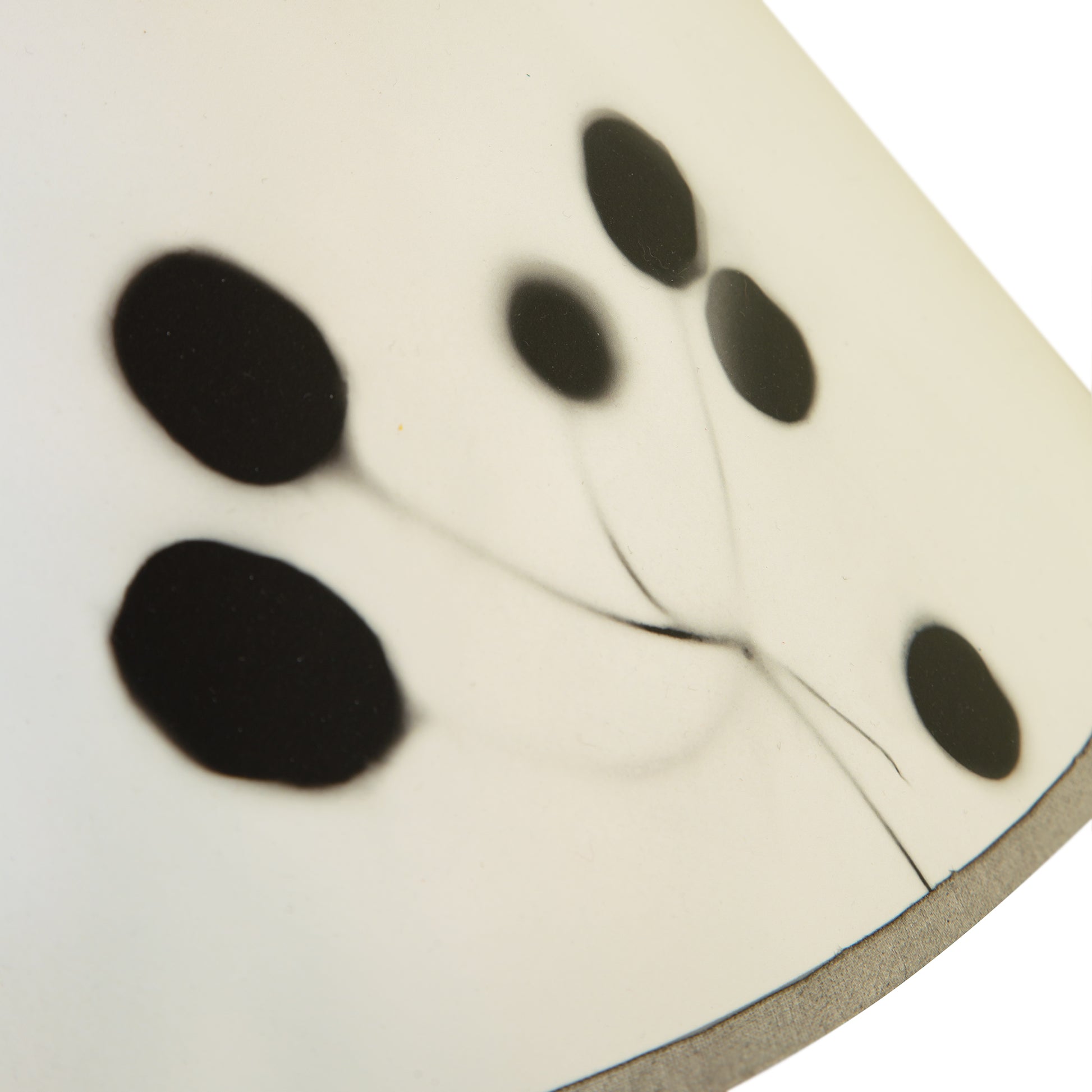 Rock River Studio Dance of Life Table Lamp – floor model featuring a white base with black oval spots and thin gray lines, highlighting unique artisan craftsmanship.