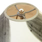 Dance of Life Table Lamp by Rock River Studio featuring intricate metal spokes and connector inside the shade, highlighting fine craftsmanship.