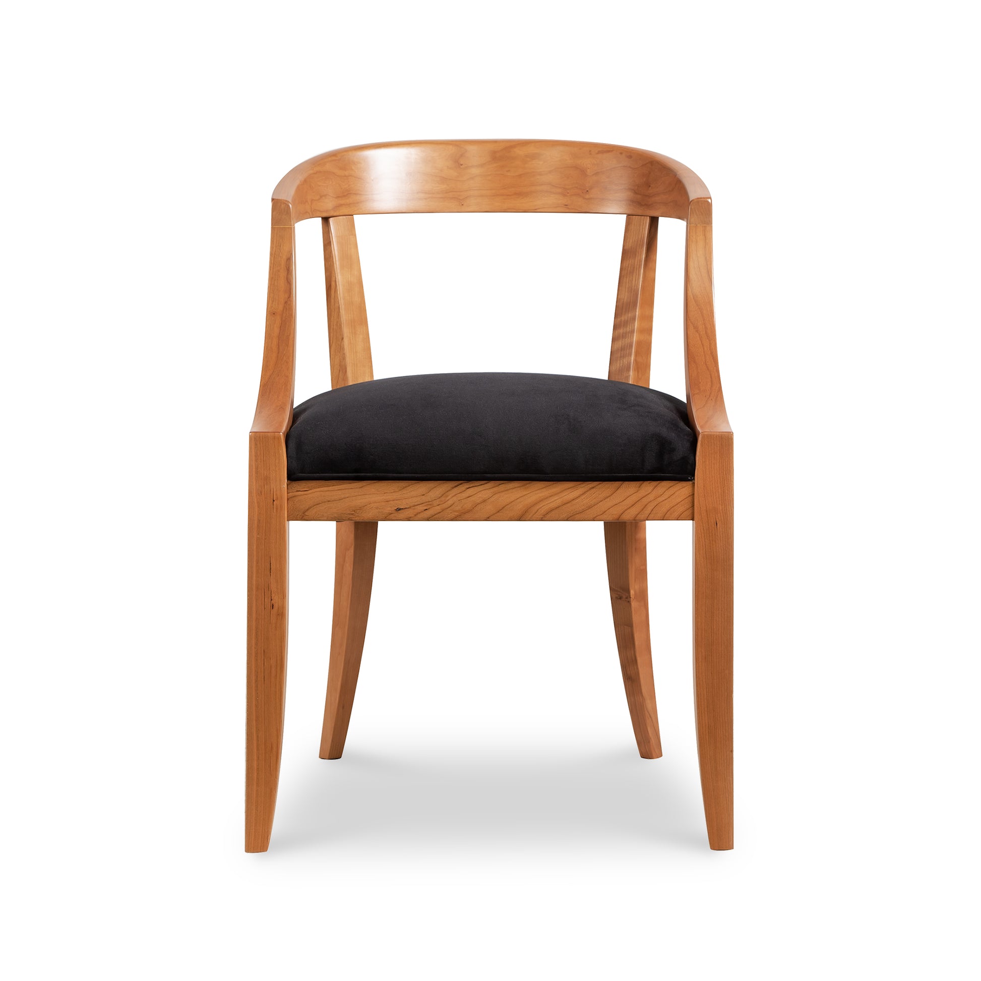 Dorset Chair with sleek design, curved backrest, armrests, and black cushioned seat showcasing modern elegance from Vermont Woods Studios.