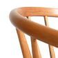 Close-up of Dover Curveback Windsor Chair in Cherry by Vermont Woods Studios, highlighting its elegant curved backrest and finely crafted spindles.