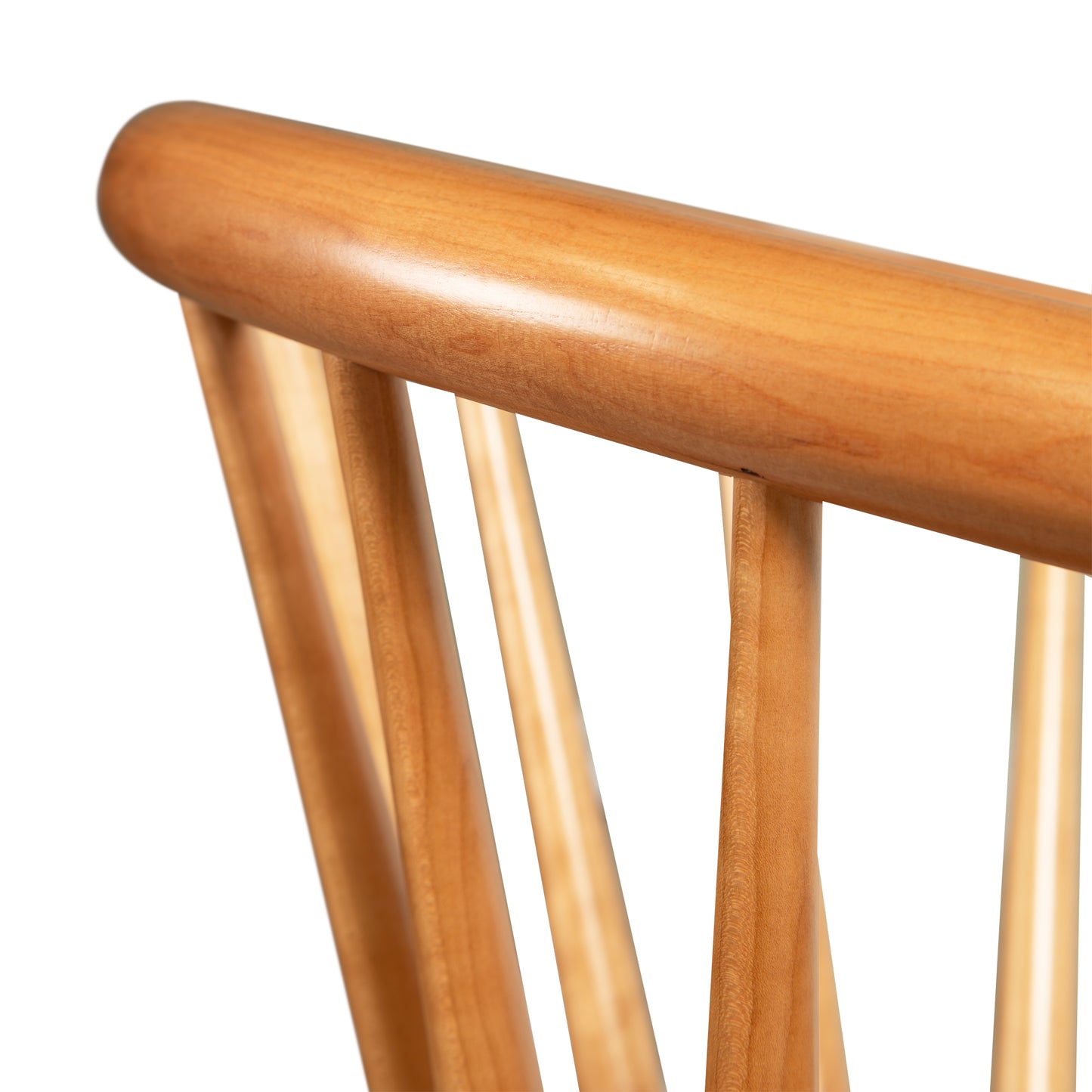 Dover Curveback Windsor Chair in Cherry by Vermont Woods Studios, featuring smooth vertical slats and rich cherry wood grain craftsmanship.