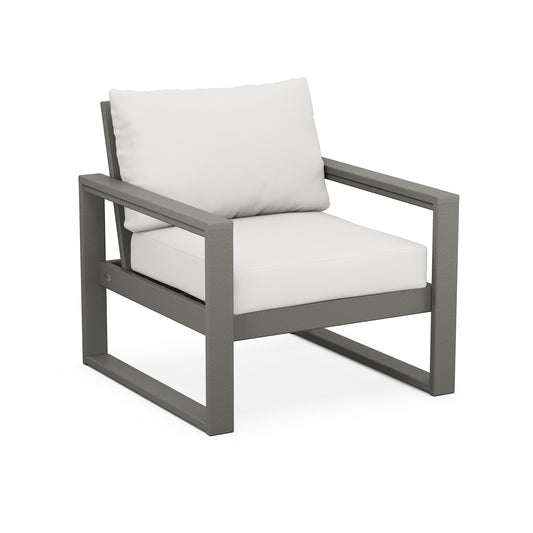POLYWOOD EDGE Club Chair with gray metal frame, white cushions, square armrests, and geometric base designed for outdoor use.