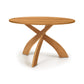 Entwine Round Solid Top Table by Copeland Furniture with three elegant curved wood legs, expertly crafted and made in America.