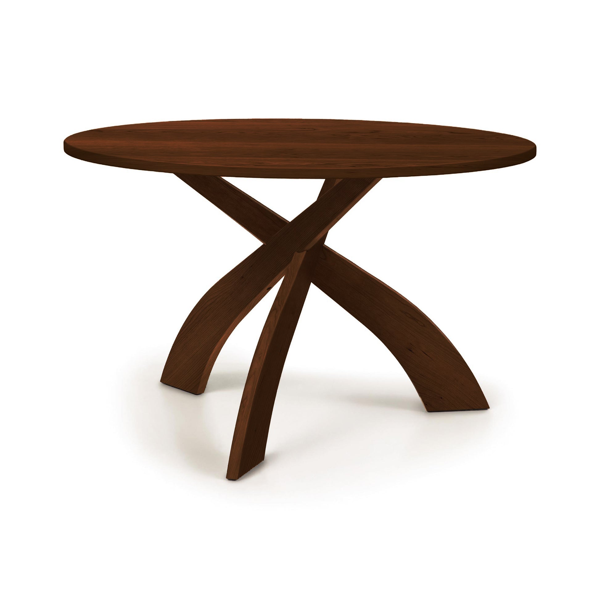 Entwine Round Solid Top Table by Copeland Furniture with a rich dark finish and three curved, intersecting solid wood legs, American made.