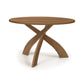 Entwine Round Solid Top Table by Copeland Furniture with smooth round surface and three curved legs, American made, crafted for durability and elegance.