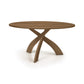 Entwine Round Solid Top Table by Copeland Furniture with smooth cherry wood top and three uniquely curved intersecting legs, handcrafted in Vermont.