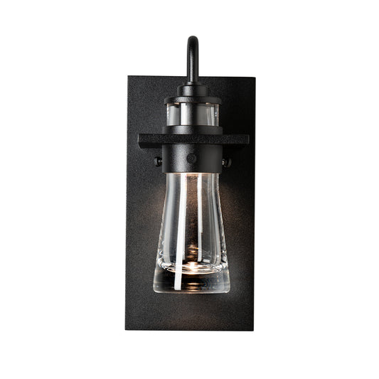 Close-up of the Hubbardton Forge Erlenmeyer Medium Outdoor Sconce in black metal and clear glass, crafted in Vermont for quality American-made outdoor lighting.