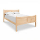 Essex High Footboard Bed by Vermont Furniture Designs in solid hardwood, showcasing high footboard craftsmanship, white bedding, and two pillows.