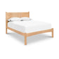 Essex Bed by Vermont Furniture Designs in natural eco-friendly finish on solid hardwood with white sheet and two plush pillows.