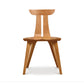 Estelle Chair by Copeland Furniture with a curved back and angular legs, crafted from solid American hardwood for a sleek, modern look.