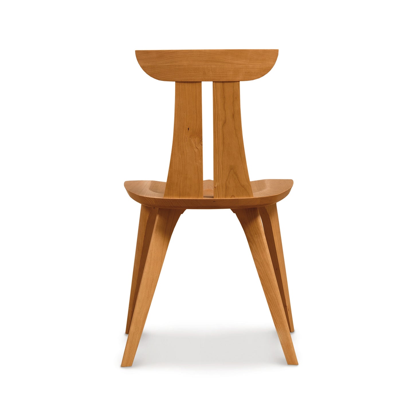 Estelle Chair by Copeland Furniture showcasing solid American hardwood with a natural finish, elegant curved backrest, and sleek angled legs.