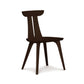 Estelle Chair by Copeland Furniture: elegant dark wood with curved backrest and outward-angled legs.