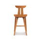 Estelle Counter Stool by Copeland Furniture, showcasing a sculpted wooden seat, curved backrest, and elegantly angled legs in a mid-century modern design.