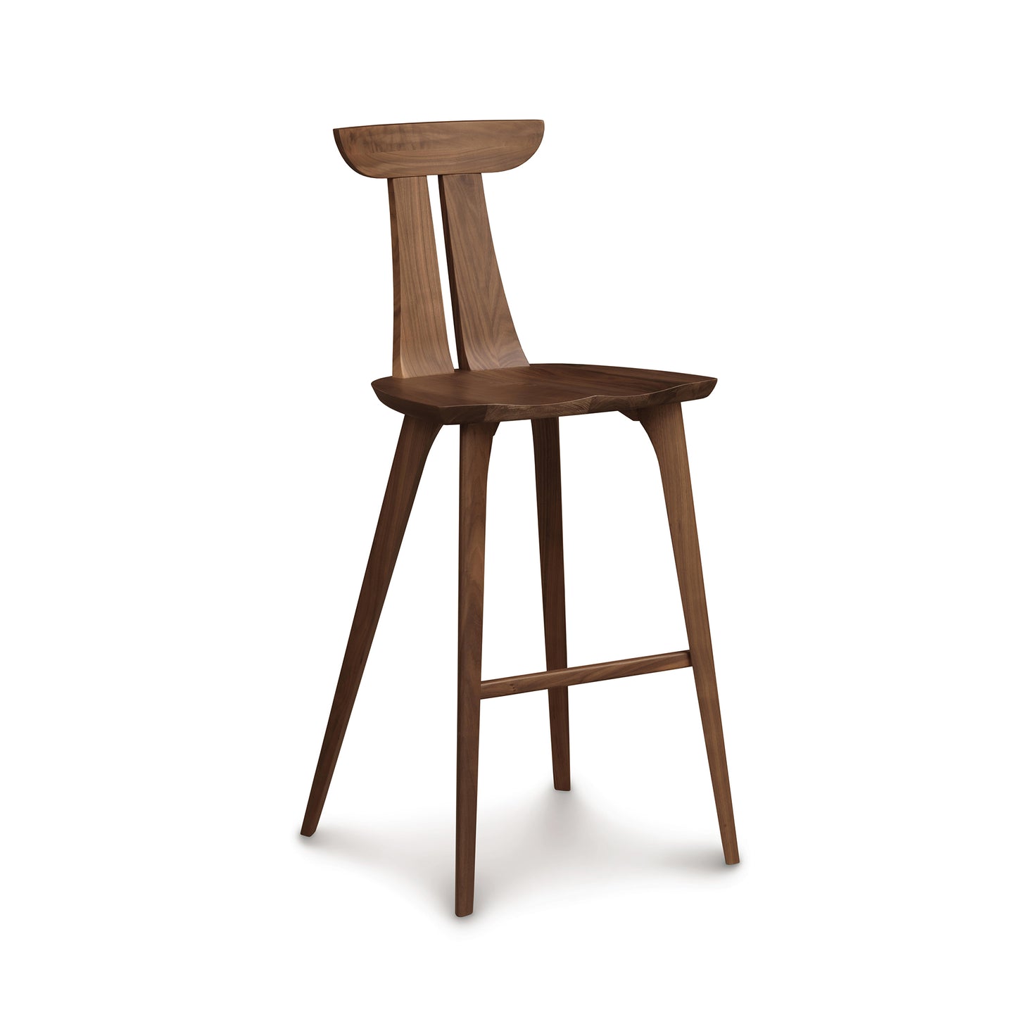 Estelle Counter Stool by Copeland Furniture with a curved backrest, angled legs, and footrest, showcasing its elegant wooden design.