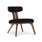 Estelle Lounge Chair by Copeland Furniture with angled legs, curved solid walnut backrest, and black upholstered seat, handcrafted in the USA.