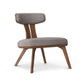 Estelle Lounge Chair by Copeland Furniture in solid walnut with sculpted, angled legs and plush light gray upholstered seat, American made.