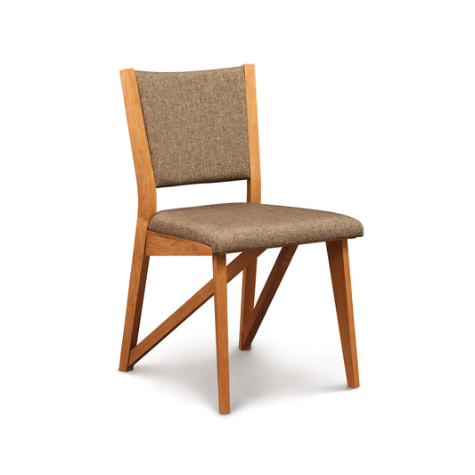 Exeter Chair by Copeland Furniture featuring a modern design with a brown upholstered seat and backrest supported by a sleek white base.