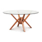 Exeter Round Glass Top Table by Copeland Furniture with an elegant intersecting solid wood base handcrafted in Vermont.