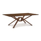 Exeter Solid Top Dining Table by Copeland Furniture with a geometric base and splayed legs, crafted from solid wood.
