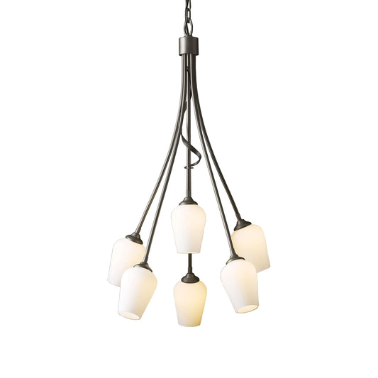 Hubbardton Forge Flora 6-Arm Chandelier with frosted glass shades and a dark metal frame in an elegant blacksmith-inspired design.
