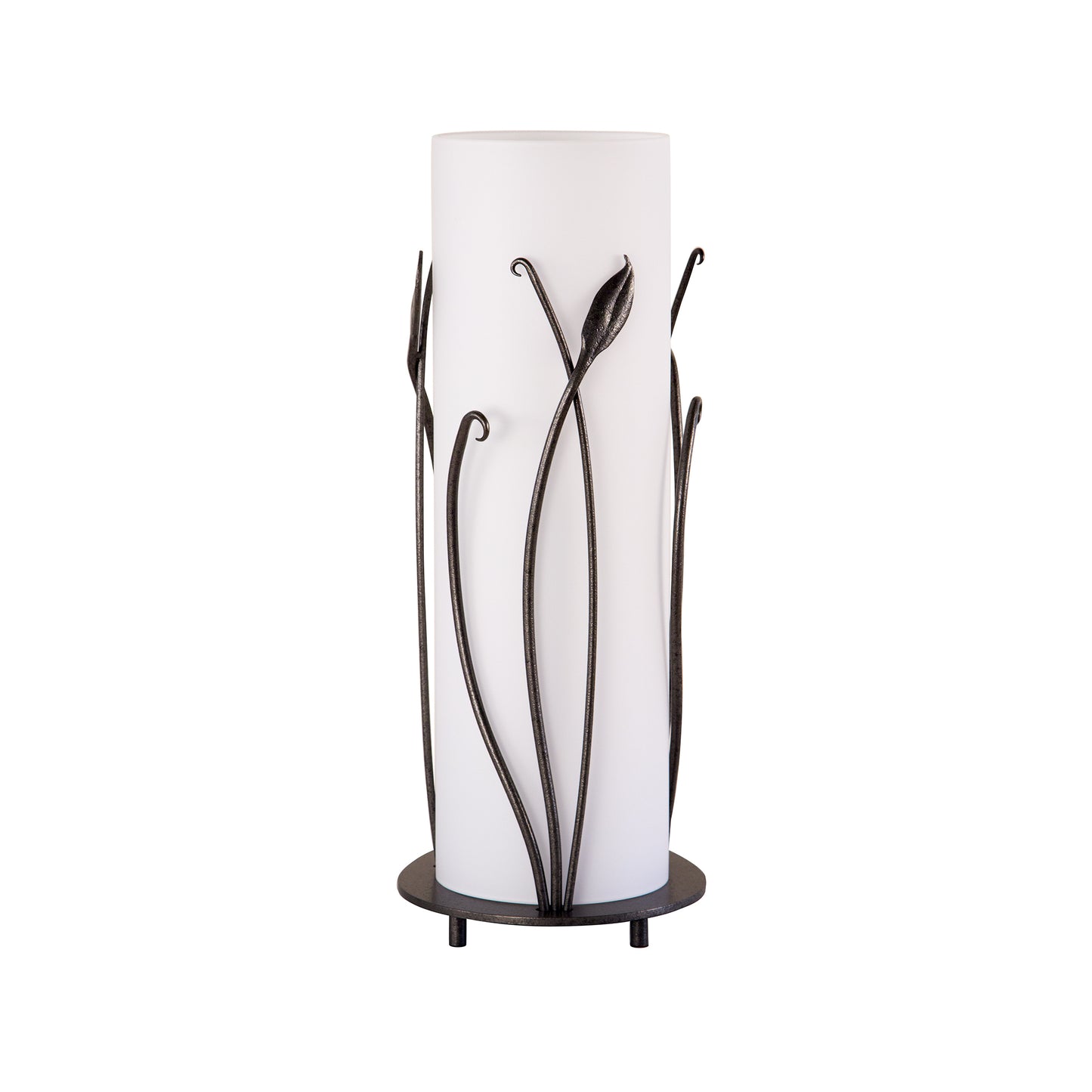 Tall cylindrical Hubbardton Forge Table Lamp with forged leaves, featuring a bronze frame and a round base with three legs.