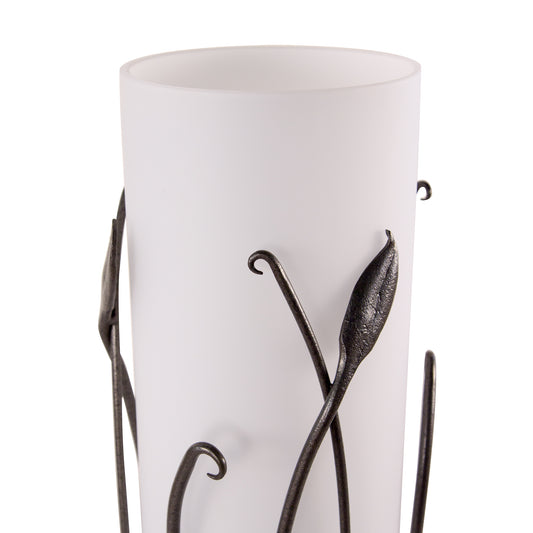 Elegant Forged Leaves and Glass Table Lamp with vine design by Hubbardton Forge, showcasing a striking white cylinder shape.