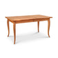 French Country Extension Dining Table by Lyndon Furniture with elegant curved legs and a smooth hardwood top, expertly handcrafted in Vermont.