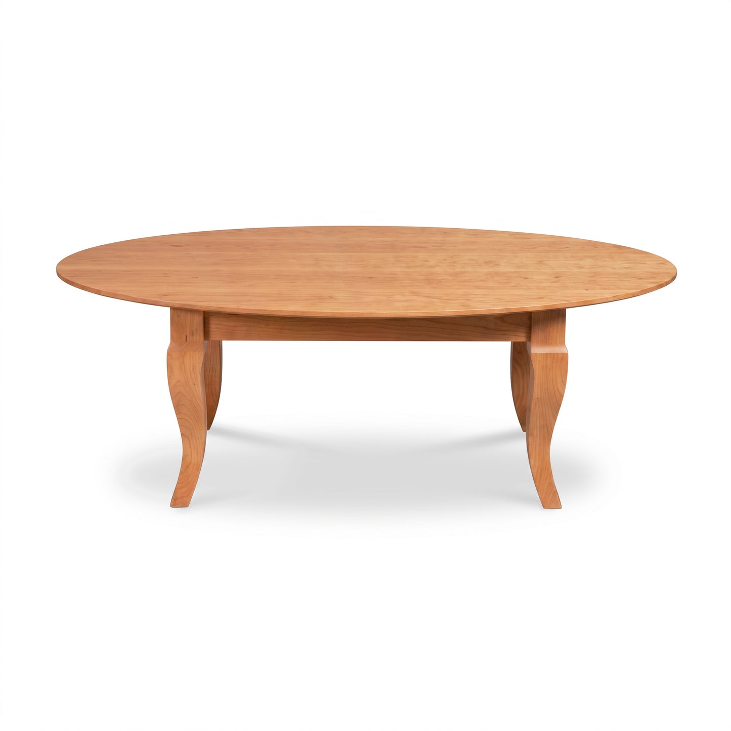 Lyndon Furniture French Country Oval Coffee Table featuring a solid wood top and elegant curved legs, handcrafted in Vermont.