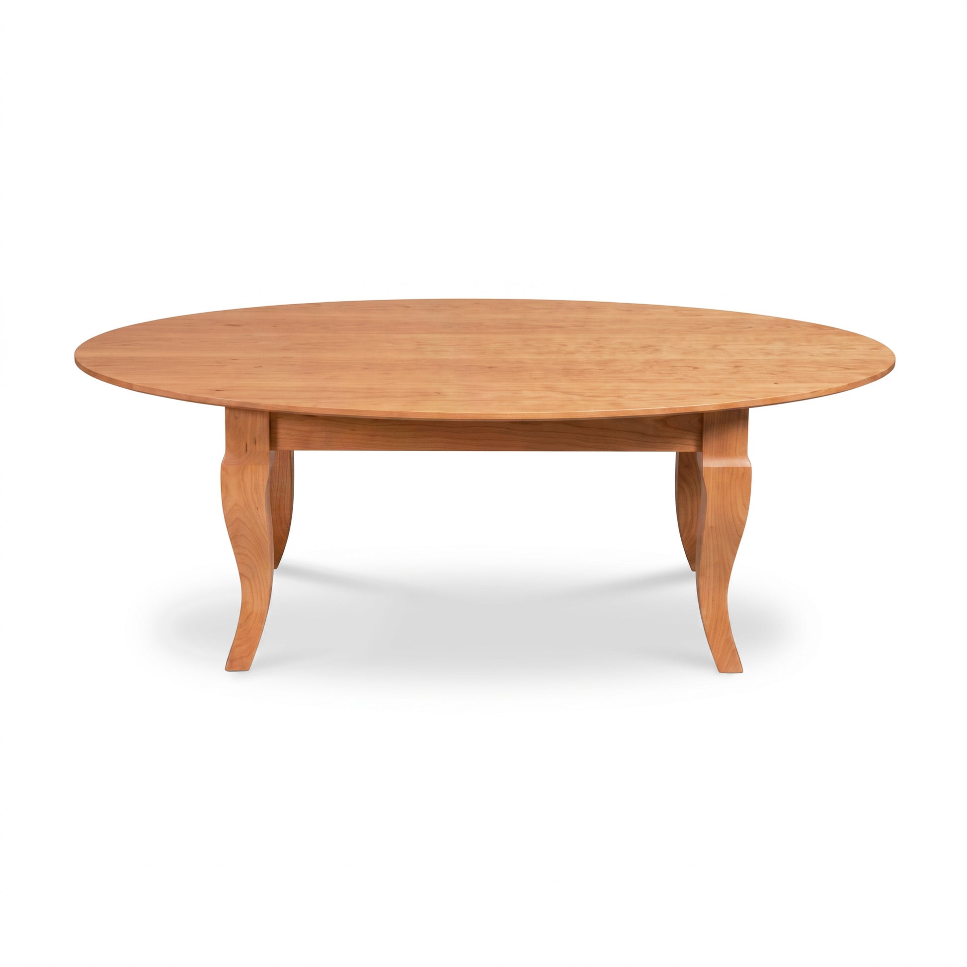 Lyndon Furniture French Country Oval Coffee Table featuring a solid wood top and elegant curved legs, handcrafted in Vermont.