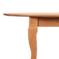 Lyndon Furniture French Country Oval Coffee Table with a smooth top and graceful curved legs, handcrafted in Vermont from solid wood.