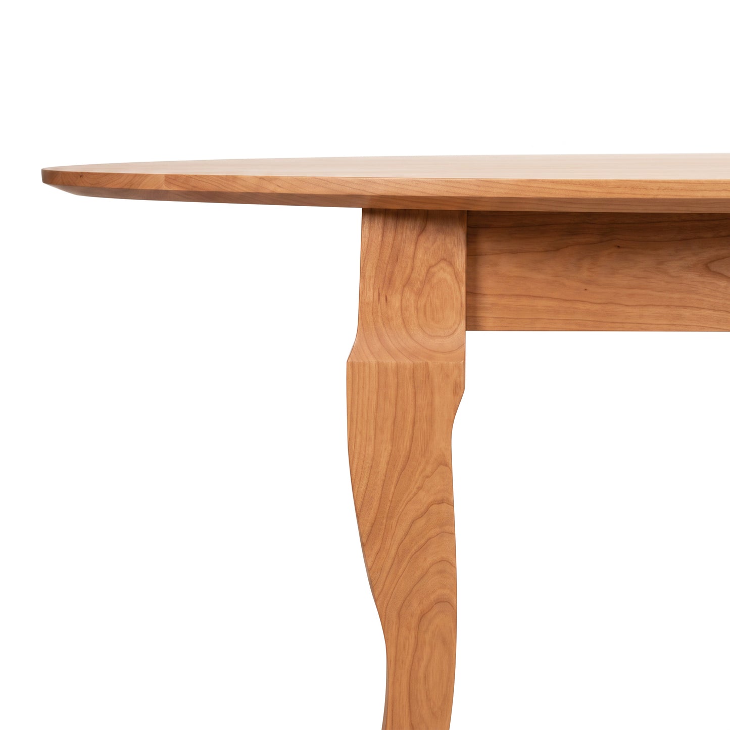 Lyndon Furniture French Country Oval Coffee Table with a smooth top and graceful curved legs, handcrafted in Vermont from solid wood.