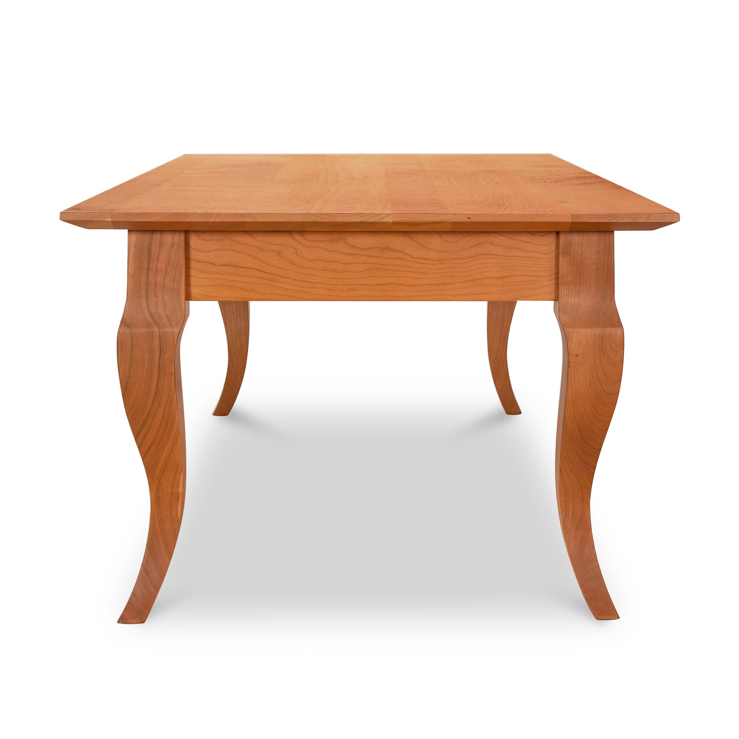 Lyndon Furniture French Country Coffee Table with a rectangular hardwood top and elegant curved legs, crafted from sustainably sourced wood.