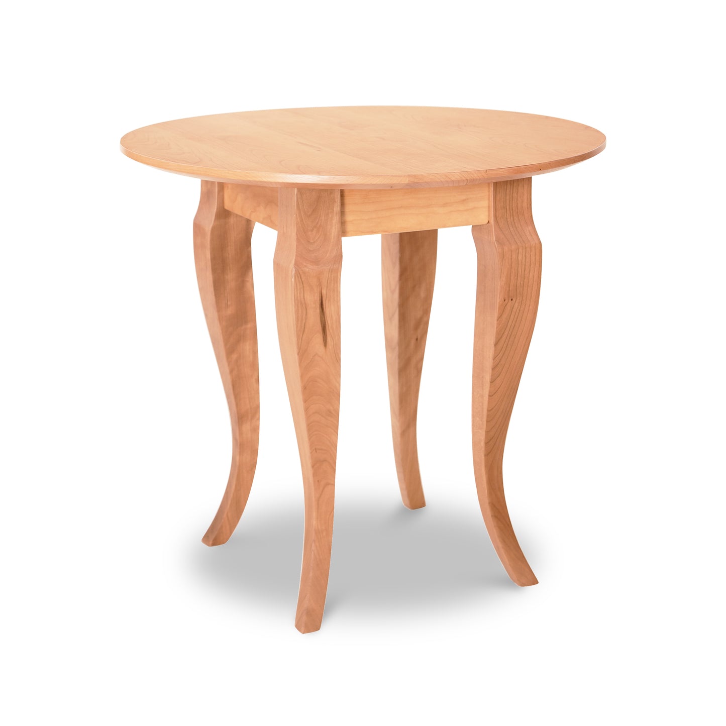 Lyndon Furniture French Country Round End Table with four curved legs and solid wood construction.