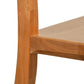 Detailed close-up of the Grafton Chair by Vermont Woods Studios, showcasing expert craftsmanship and natural wood joinery on seat and backrest.