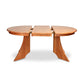 Hampton Split Pedestal Extension Table by Lyndon Furniture, solid wood with a central leaf and curved legs, partially open to show extension feature.