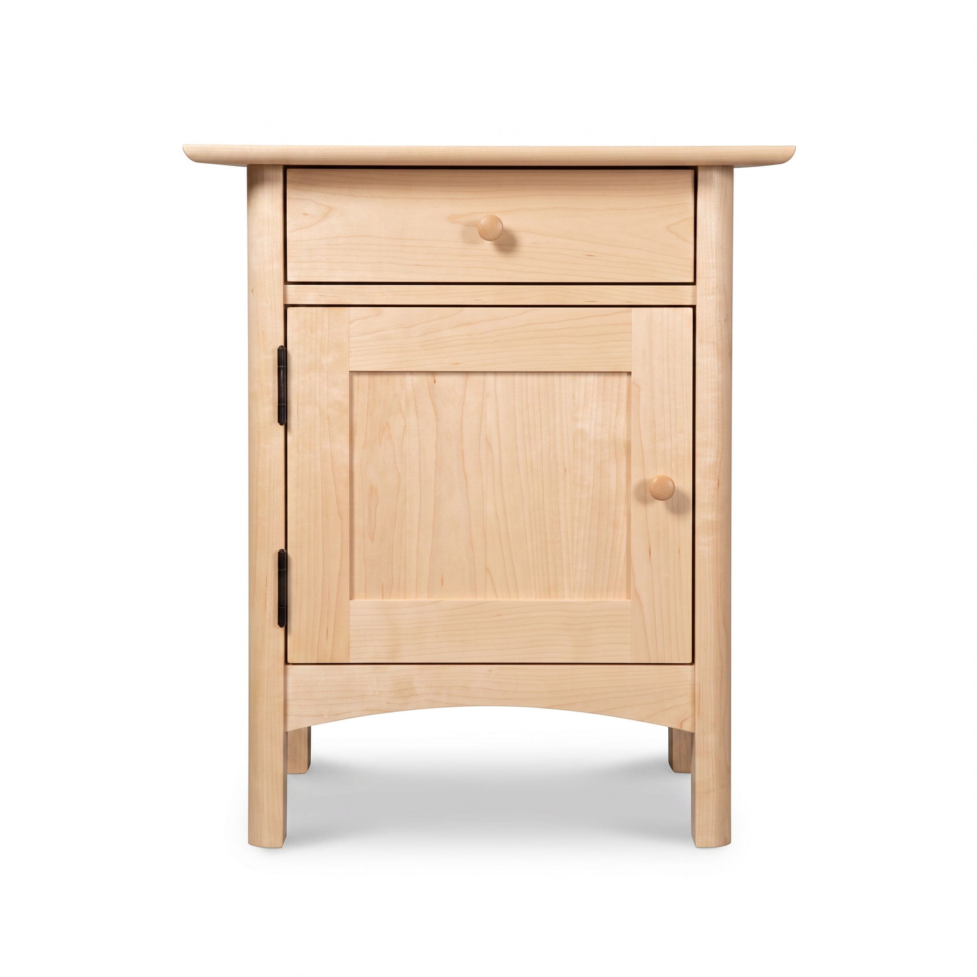 Heartwood Shaker 1-Drawer Nightstand with Door in light wood by Vermont Furniture Designs, highlighting its craftsmanship and clean shaker style.