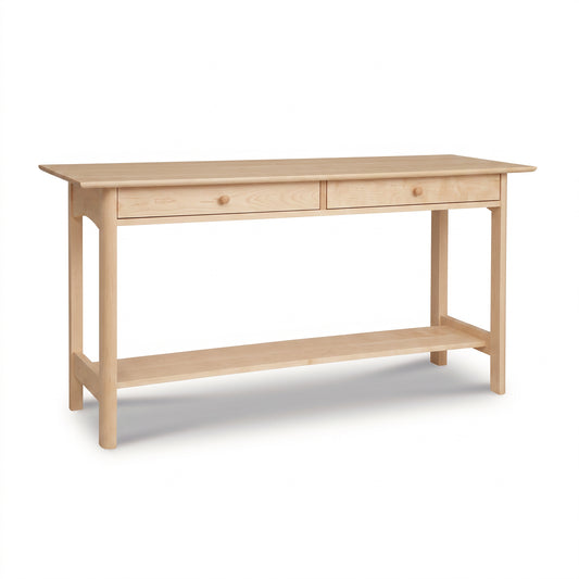 Heartwood Shaker 2-Drawer Console Table in light wood by Vermont Furniture Designs, featuring a lower shelf and classic craftsmanship.