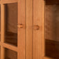 Heartwood Shaker 2-Glass Door Bookcase by Vermont Furniture Designs, showcasing solid wood construction, classic wooden knobs, and clear glass door panels.