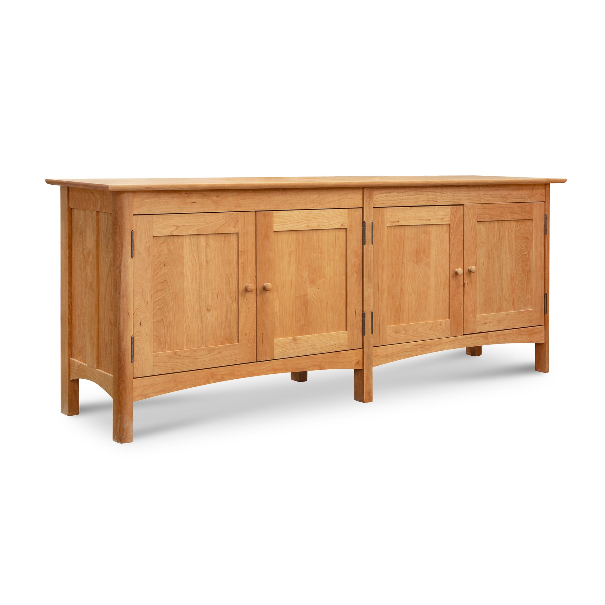 Heartwood Shaker 4-Door Console Bookcase features handcrafted simplicity with rounded legs and a natural finish, exemplifying Vermont Furniture Designs' quality craftsmanship.