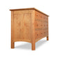 Heartwood Shaker 6-Drawer Dresser by Vermont Furniture Designs, crafted from solid hardwood with a natural finish, highlighted from a low angle.