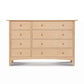 Heartwood Shaker 8-Drawer Dresser by Vermont Furniture Designs, featuring eight drawers with wooden knobs, handcrafted from solid wood.